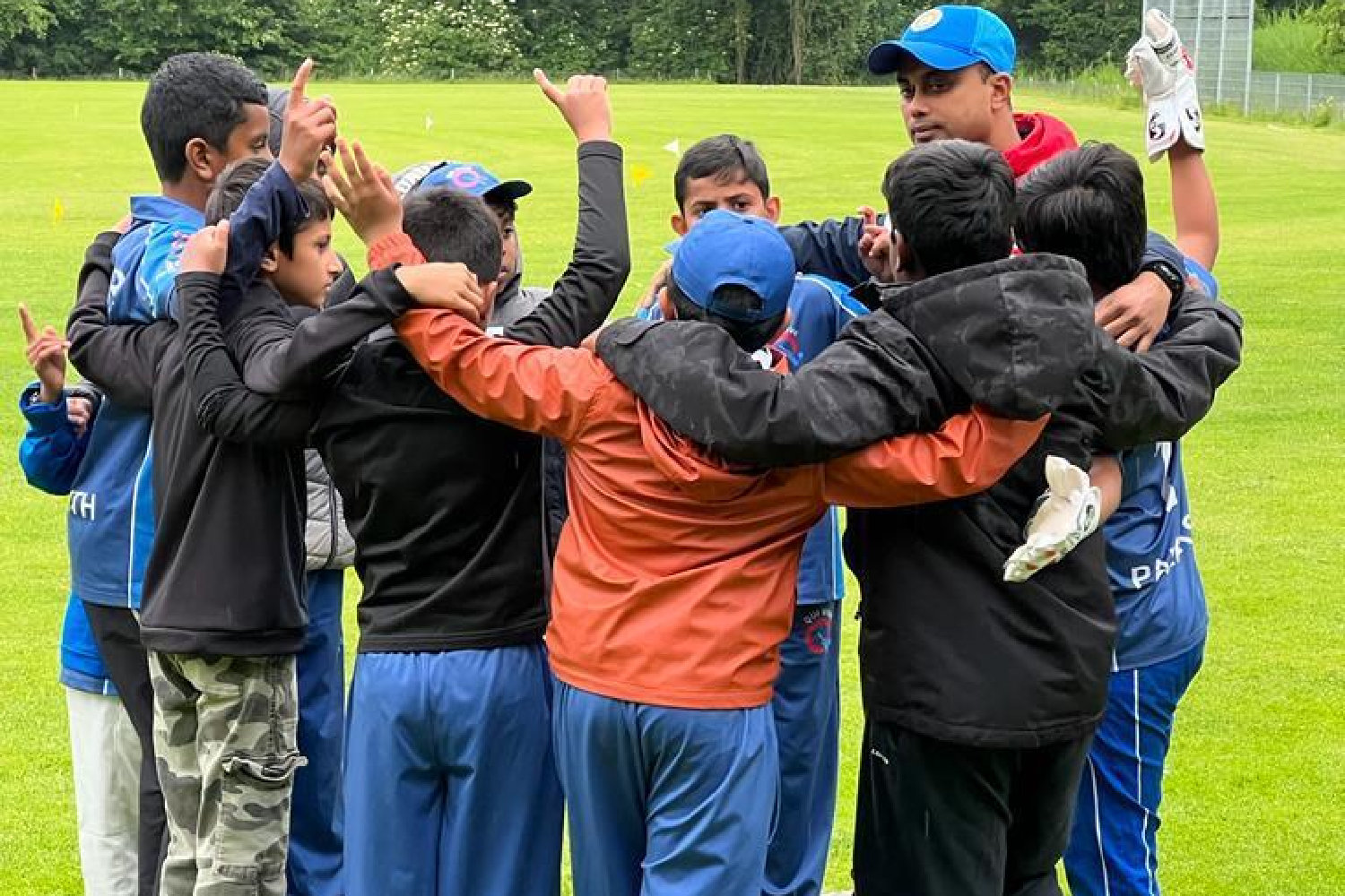 Where it all starts: The weekly huddle at the Cricket Club.
