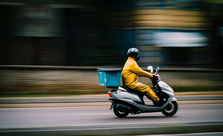 Courier in motion symbolizing flexible, tech-driven income opportunities.